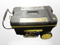 A Stanley pro-mobile tool chest containing assorted hand and power tools.