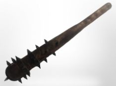 A reproduction World War One-style trench club, length 65cm.
