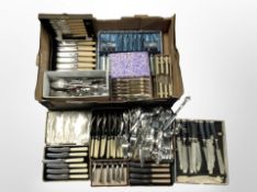 A quantity of boxed and unboxed EPNS and stainless steel cutlery.