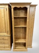 A contemporary pine open bookcase, 75cm wide x 29cm deep x 200cm high.