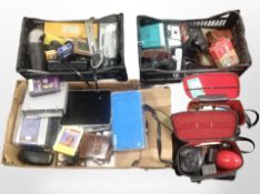 A collection of photography-related items including cameras, accessories,