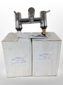 Three Noken chrome bath mixer taps, two in boxes.