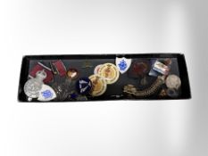 A collection of enamelled badges and medals, French medallion on filigree fob, etc.