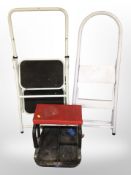 A Clarke mechanic's stool on castors, together with two folding steps.