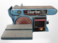 A Clarke Woodworker 4-inch belt, 6-inch disc sander.