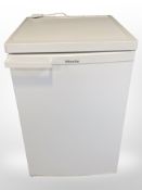 A Miele under-bench fridge.