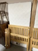 A contemporary oak three-foot bed frame with Cotswolds Beds mattress.