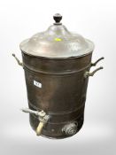 A brass and copper water urn, height 55cm.