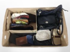 A quantity of lady's leather handbags and purses.