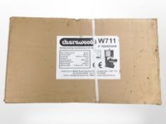 A Charnwood W711 8-inch band saw, sealed in packaging.