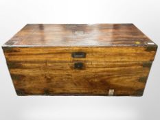 A Victorian camphor wood campaign chest with brass corner mounts,