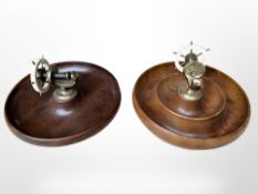 Two turned mahogany nutcracker dishes, width 23cm.