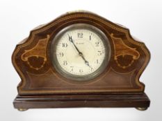 An Edwardian mahogany and satinwood-inlaid eight-day mantel clock, width 23cm.