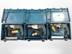 Three Makita two-speed hammer drills, all boxed.