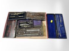 A group of precision drawing sets.