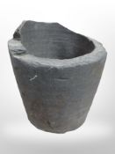 A stone garden planter, height 40cm.