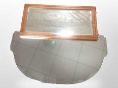 An Art Deco frameless bevelled mirror, width 77cm, and a further mahogany mirror.