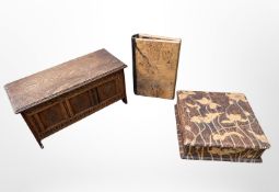 An Arts and Crafts pokerwork lidded box, width 18cm,