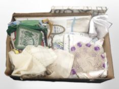 A quantity of vintage linen, doilies, table napkins, etc.