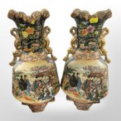 A pair of 20th-century Japanese export twin-handled earthenware vases, height 34cm.