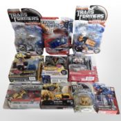 10 Hasbro Transformers figurines, boxed.