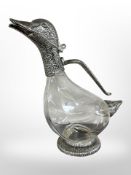 A silver plated-mounted claret jug in the form of a duck,