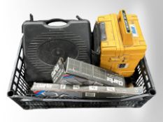 A group of boxed power tools including two Clark welding clamp sets, a camping stove, etc.