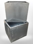 A pair of galvanised metal cube planters, width 45cm.