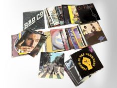 A collection of vinyl LP records to include The Beatles Abbey Road, Roxy Music, Fleetwood Mac,