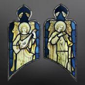 A pair of Angel Musicians, a lutenist and trumpeteer, two trapezoidal stained,