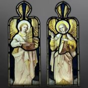 A pair of Angel Musicians, an organist and a drummer, two trapezoidal stained,