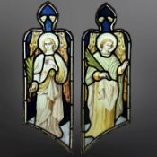 A pair of Angels holding palm branches, symbolising martyrdom, two trapezoidal stained,
