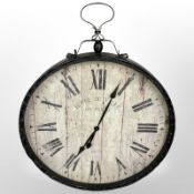A large contemporary quartz wall clock in metal surround,