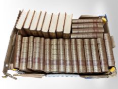 A collection of Charles Dickens volumes,