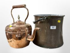 A 19th-century copper swing-handled cooking pot, and a kettle, tallest 31cm.