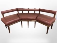 A mahogany framed window settee with oxblood leather cushions,