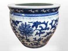 A reproduction Chinese blue and white porcelain jardinieré, diameter 46cm.