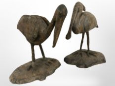 Two early-20th century wooden carvings of a shoebill and a spoonbill, tallest 17cm.