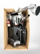 A Royal typewriter, photographic enlarger, Poppy radio, etc.