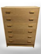 A 20th-century Danish oak veneered six-drawer chest, 76cm wide x 42cm deep x 107cm high.