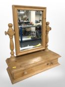 A contemporary pine dressing table mirror,
