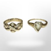Two yellow gold rings, one set with a synthetic stone. CONDITION REPORT: 8.3g.