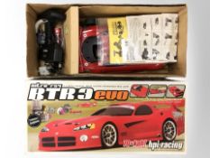 An HPI Racing RTR3 Evo 1/10 scale four-wheel drive nitro-powered RC car, in box.