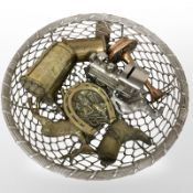 A silvered metal basket containing trench art money box,