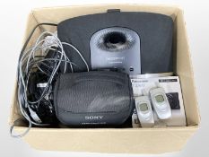 A Bowers and Wilkins Zeppelin Mini USB speaker, Panasonic Lumix digital camera, Sony video camera,