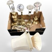 A group of 20th-century Scandinavian brass lamp bases and wall lights.