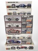 Eight scale vehicle modelling kits including Burago and Majorette.