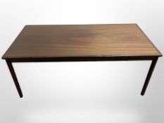 A Danish teak rectangular coffee table designed by Ole Wanscher, 130cm long x 65cm wide x 52cm high.