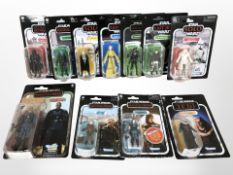 11 Kenner Star Wars figurines including The Mandalorian, Return of the Jedi, etc., boxed.