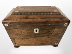 A Regency rosewood sarcophagus tea caddy with two-division interior, width 20cm.